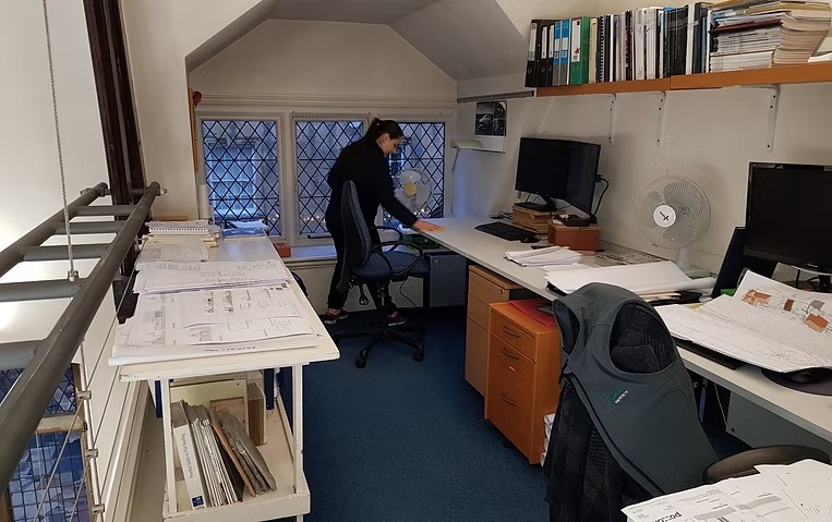 Professional cleaner carrying out end of tenancy cleaning